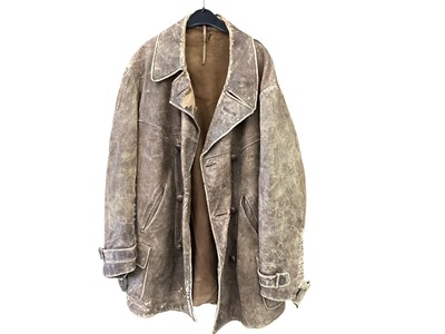 Lot 695 - Old leather motoring coat
