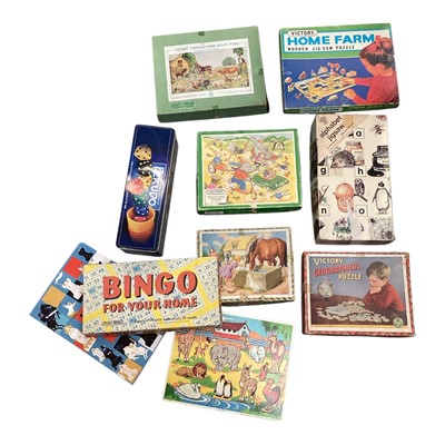Lot 703 - Group of vintage toys and games including plywood jigsaws