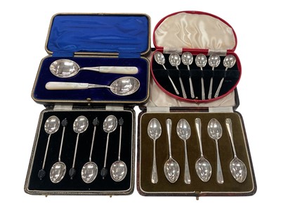 Lot 939 - Four cased sets of silver spoons including a set of six coffee bean end spoons and a pair with mother of pearl handles