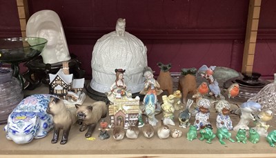 Lot 716 - Victorian cheese dome with surmounted cat, on associated base, pair of treacle glazed figural flaks and other decorative ceramics and glass