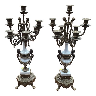 Lot 712 - Pair of 19th century style gilt brass and marble candlesticks with scroll supports