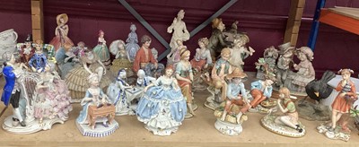 Lot 706 - Large quantity of Capodimonte Naples, Dresden lace lady's and other figurines