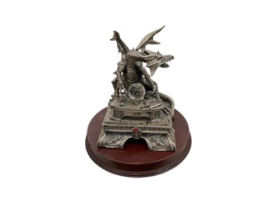 Lot 457 - Three Tudor Mint dragon figures with stands and two others (5)
