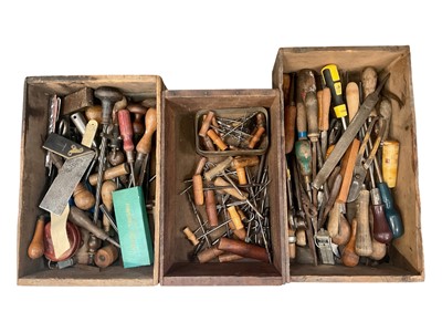 Lot 725 - Six vintage wooden crates containing old wood hand tools, chisels, drawing sets etc