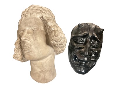 Lot 303 - Antique German plaster cast wall mask of Bamberg Horseman, together with a devil mask (2)