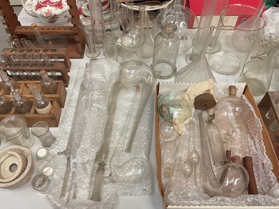 Lot 311 - Collection of 19th century scientific equipment, mostly glass bottles, test tubes, measuring jugs etc