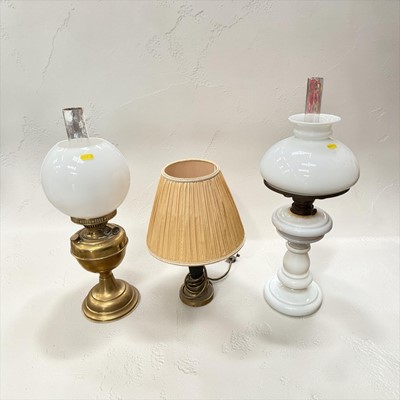 Lot 28 - Vintage brass oil lamp with glass shade, another glass oil and shade and an antique table lamp (3)