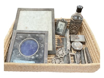 Lot 913 - Two silver mounted photograph frames, Victorian silver bottle holder, other silver and white metal items