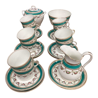 Lot 42 - English porcelain ten place setting teaset with floral and turquoise borders