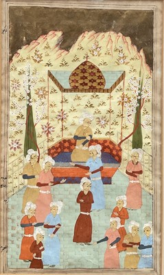 Lot 332 - Antique Persian School ink and watercolour - Figures Gathered, 25cm x 15cm, in glazed gilt frame