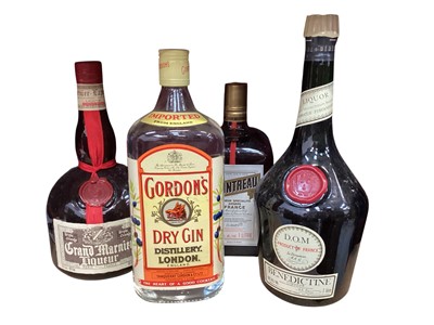 Lot 701 - Four bottles of spirits including Gordon's Gin , Cointreau, Grand Marinier and Benedictine (1 box)