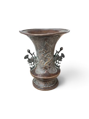 Lot 67 - Antique Japanese bronze twin-handled vase with floral decoration in relief