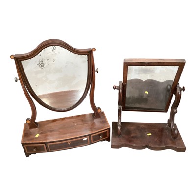 Lot 1311 - Antique inlaid mahogany shield shape toilet mirror with three drawers below, together with another mahogany toilet mirror (2)