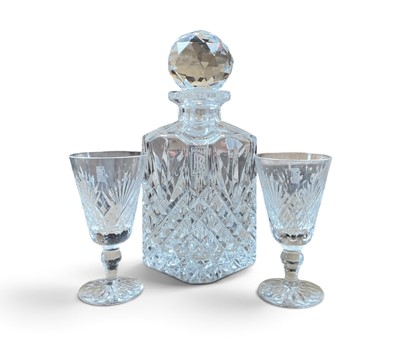 Lot 28 - Vintage lead crystal cut glass decanter, engraved with Rolls - Royce badge, together with two glasses also with engraved Rolls - Royce logos.