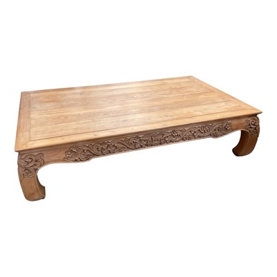 Lot 1318 - Very large hardwood low table with carved decoration to the sides, 199cm x 119cm x 48.5cm
