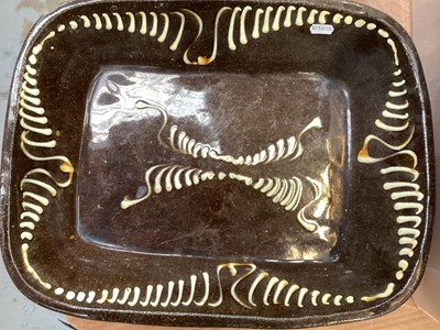 Lot 500 - Large antique slip glazed pottery dish and one other (2)
