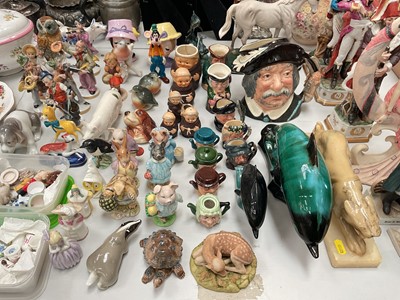 Lot 330 - Collection of animal and figure ornaments including Beswick Beatrix Potters, Royal Worcester candle snuffers, Lladro puppy dog etc