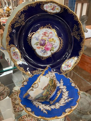 Lot 78 - Meissen cup and saucer printed and painted with Schloss Weesenstein, and a Meissen plate painted with flowers (3)