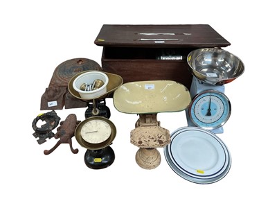 Lot 401 - Vintage kitchen scales, wooden box containing a collection of vintage tins and cast iron items including a door knocker