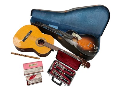 Lot 342 - Two acoustic guitars, Yamaha clarinet in case, harmonicas etc