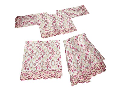 Lot 341 - Large collection of African clothing, mostly dresses and skirt/top two pieces, including bright patterned fabrics, beadwork, lace etc