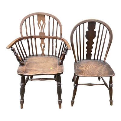 Lot 1345 - Antique oak elbow chair with pierced splat back, together with another chair (2)