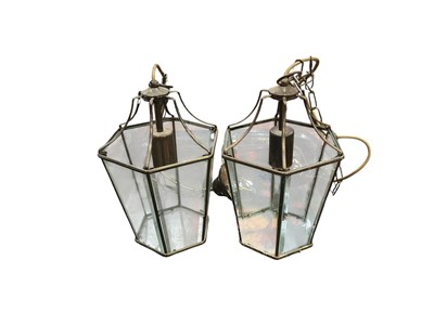 Lot 731 - Pair of drop pendant electric light lanterns, plus three others and an oil lamp.