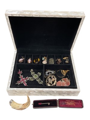 Lot 1003 - Mother of pearl jewellery box containing two silver / white metal large gem set cross pendants, small yellow metal cross pendant, one 9ct gold cufflink, shell pendants and earrings etc