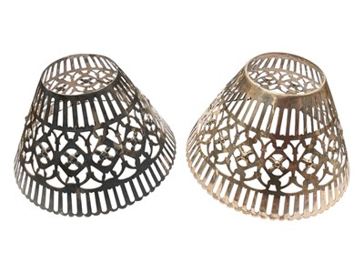 Lot 909 - Pair of white metal light shades with pierced decoration