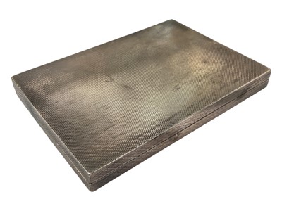 Lot 910 - Art Deco silver cigarette case with engine turned decoration and slide opening