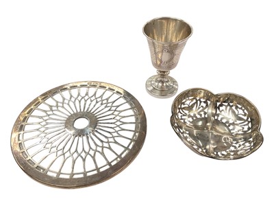 Lot 912 - Late 19th / early 20th century French silver cup with engraved Greek key decoration (maker J. Granvigne), together with a 1920s silver pierced dish and teapot stand (3)