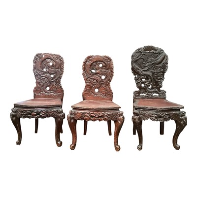 Lot 1364 - Three Chinese chairs with carved decoration