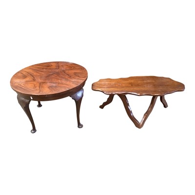 Lot 1375 - Walnut circular occasional table, together with a coffee table with shaped top (2)