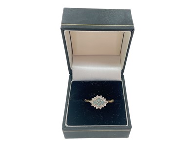 Lot 984 - 18ct gold aquamarine and diamond cluster ring