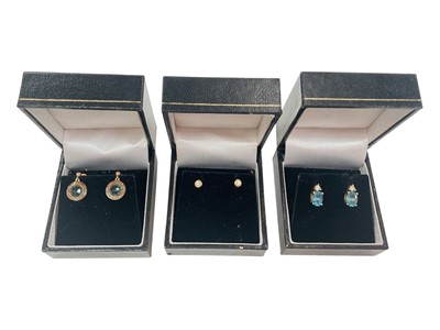 Lot 985 - Three pairs of gold and gem set earrings