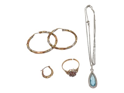 Lot 986 - 9ct white gold blue topaz and diamond pendant on chain, 9ct gold dress ring, and three 9ct gold earrings
