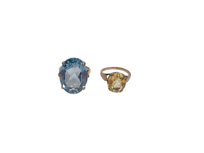 Lot 923 - 9ct gold oval mixed cut citrine ring and 9ct gold synthetic blue spinel cocktail ring (2)