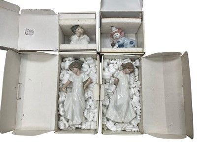 Lot 449 - Five Lladro & three Nao figurienes, to include two clowns, two pandas, two polar bears etc, boxed (8) (1 box)