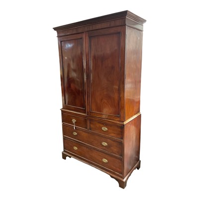 Lot 1393 - Nineteenth century mahogany two height linen press with five slides above enclosed by two panelled doors, two short and three long drawers below on bracket feet, 125cm wide, 54cm deep, 219cm hig...