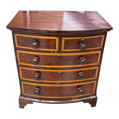 Lot 1395 - Victorian mahogany miniature bowfront chest of two short and three long drawers on bracket feet, 47cm wide, 33.5cm deep, 50cm high
