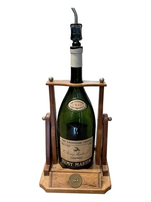Lot 213 - Large vintage bottle of Remy Martin cognac on dispensing stand, and other items