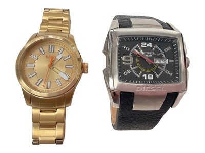 Lot 943 - Hugo Boss gentlemen's gilt metal wristwatch HB 207.1.34.2633 and a Diesel wristwach, Ref: DZ 1-2-15 (2)