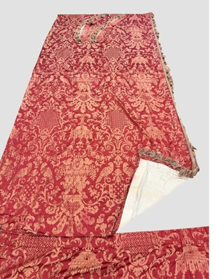 Lot 226 - Pair of 20th century Venetian silk curtains in the Mario Fortuny damask with classical motifs, lined back and fringed, with pair of matching tie backs, 315cm deep x 145cm wide