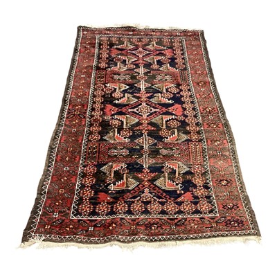 Lot 1427 - Eastern red and blue rug, 192cm x 104cm