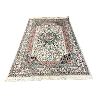 Lot 1433 - Eastern rug with central medallion on cream, red and turquoise ground, 234cm x 151cm