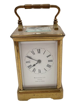 Lot 352 - 1920s French carriage clock with striking movement retailed by Benetfink & Co. London