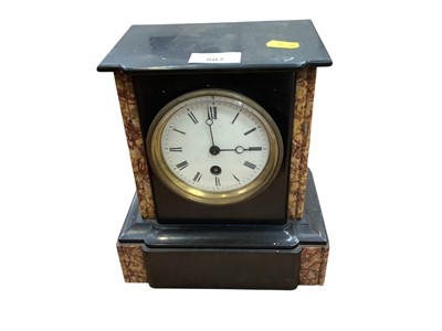 Lot 507 - Black slate and marble mantle clock featuring white enamel dial with black Roman numerals and brass bezel