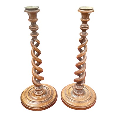 Lot 375 - Pair 1920s oak barley twist candlesticks