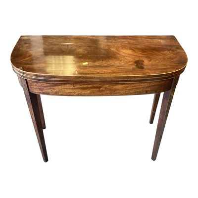 Lot 1457 - Nineteenth century mahogany tea table with foldover top on square taper legs, 91cm wide, 45cm deep, 73cn high
