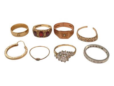 Lot 1002 - Five 9ct gold rings, one 9ct gold hoop earrings, very thin yellow metal gem set ring and a diamond half eternity ring in precious white metal setting (8)